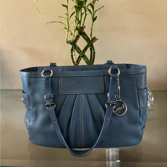 Coach Handbags - Clean inside and out just one little red dot on the front of bag